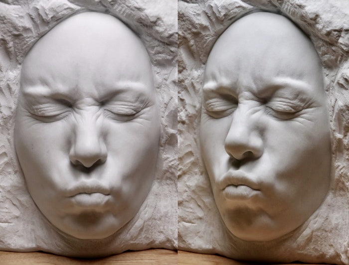 Awkward Kiss, 2023, marble, 16 x 16 x 6 in. / 40.64 x 40.64 x 15.24 cm.