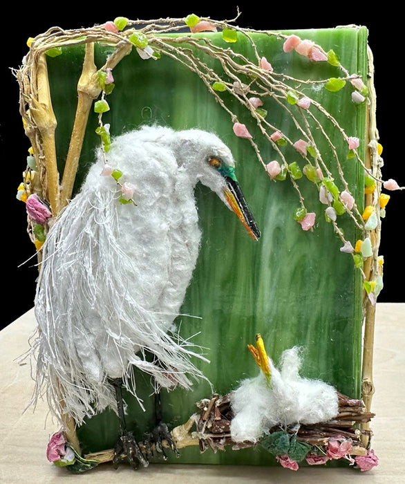 Great White Egret and Her Baby, 2024, sculpture on glass, 4 x 6 in. / 10.16 x 15.24 cm.