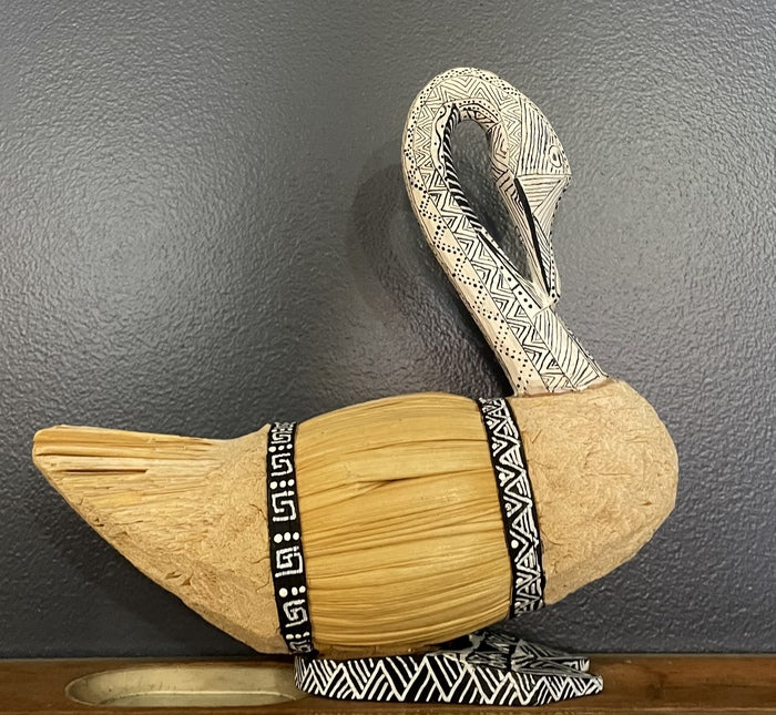 Coconut Swan, 2024, acrylic on found object, 7 x 7 x 4 in. / 17.78 x 17.78 x 10.16 cm.