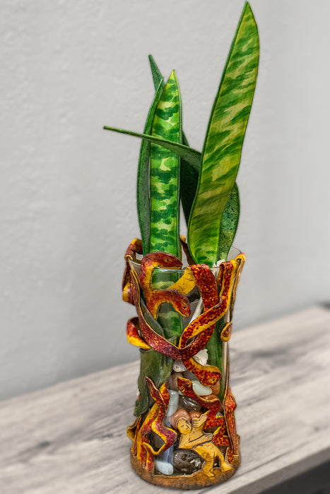 Serpentine, 2025, mixed media, 16 x 5 x 8 in. / 40.64 x 12.7 x 20.32 cm.
