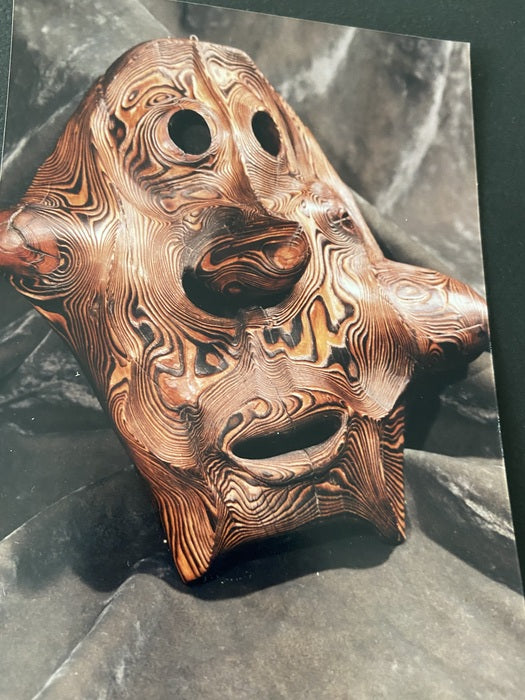 Our Bodies Die, Our Spirits Live On, 2022, wood sculpture, 14 x 24 in. / 35.56 x 60.96 cm.