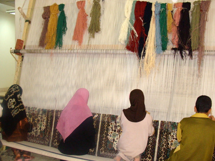 Egyptian Rug Making, A Family Affair, 2009, photography, 10 x 13 in. / 25.4 x 33.02 cm.