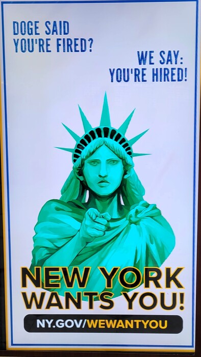 Sign of the Times - Statue of Liberty Recruiting Fired Staff, 2025, photography, 9 x 19 in. / 22.86 x 48.26 cm.