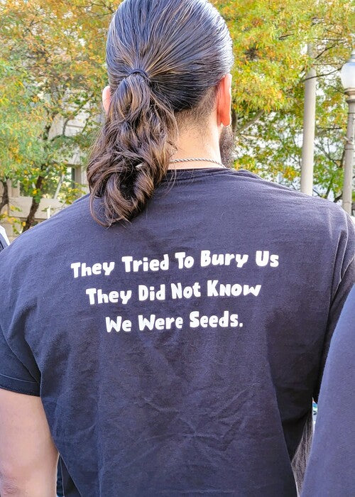 Sign of the Times - Defiant Protest Shirt Message, 2023, photography, 10 x 14 in. / 25.4 x 35.56 cm.