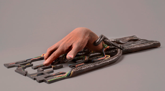 Unravel, 2016, stoneware, 6 x 32 x 10 in. / 15.24 x 81.28 x 25.4 cm.