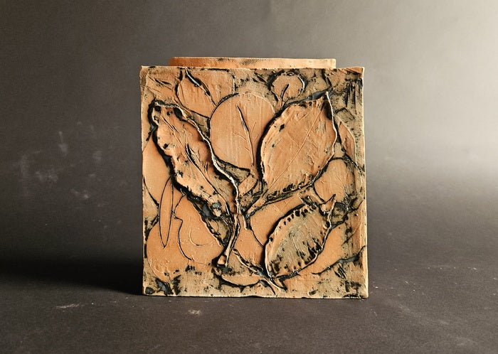 Autumn Leaves, 2025, terracotta, 7.5 x 6.75 x 2.5 in. / 19.05 x 17.14 x 6.35 cm.