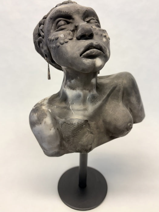 Earthfire/Resilence, 2025, clay sculpture, 7.25 x 6.75 x 8 in. / 18.41 x 17.14 x 20.32 cm.