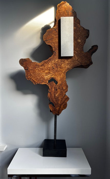 Organized Disorder, 2026, olive wood with steel and epoxy, 29 x 19 x 3 in. / 73.66 x 48.26 x 7.62 cm.