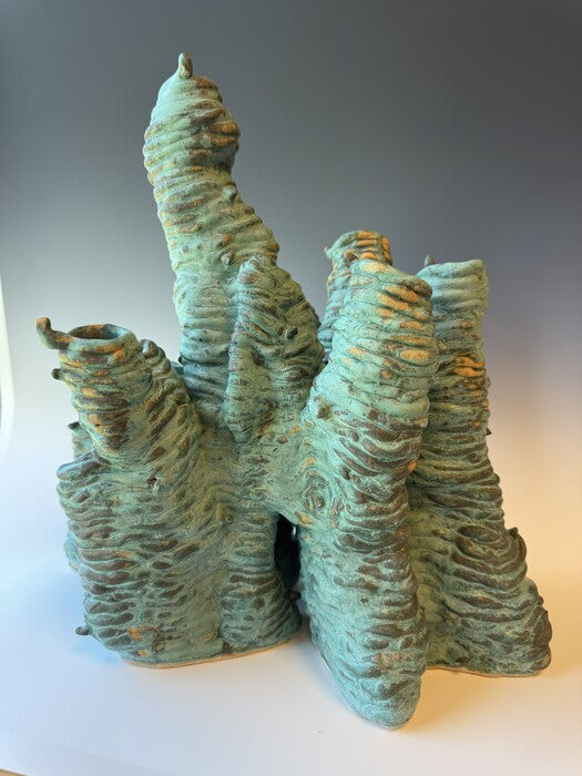 Pandora, 2026, mixed media, 15 x 16 x 10 in. / 38.1 x 40.64 x 25.4 cm.