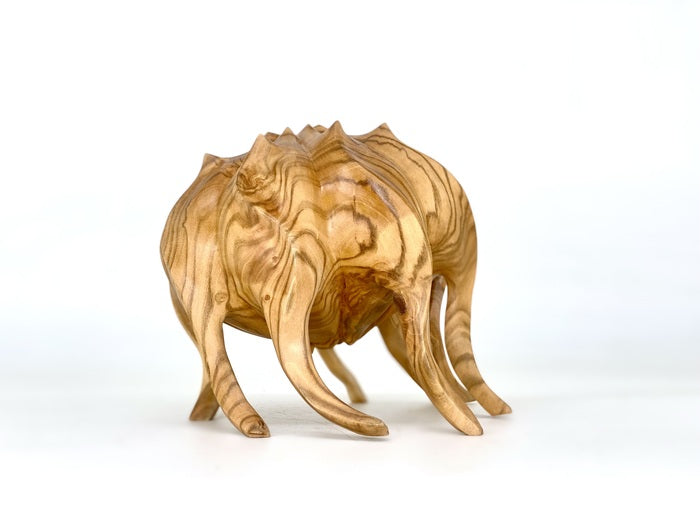 Mane, 2024, wood, 6 x 8 x 8 in. / 15.24 x 20.32 x 20.32 cm.