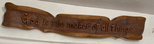 All Praise to our Creator, 2023, wood, 5 x 35 x 2 in. / 12.7 x 88.9 x 5.08 cm.