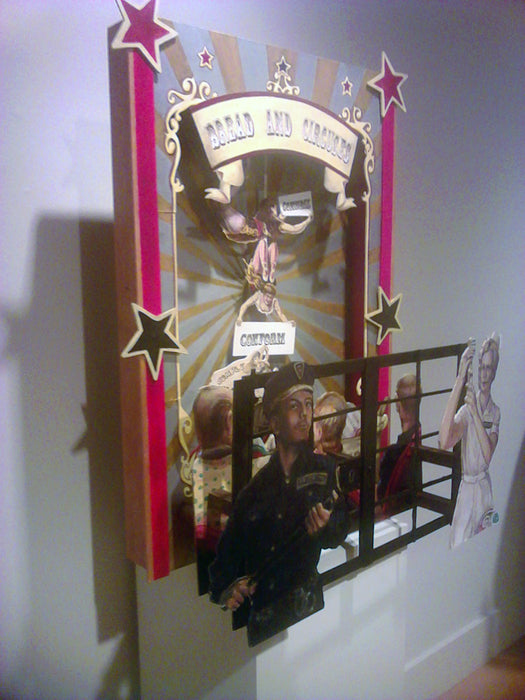 Bread and Circuses, 2020, oil on masonite, 24 x 36 x 14 in. / 60.96 x 91.44 x 35.56 cm.