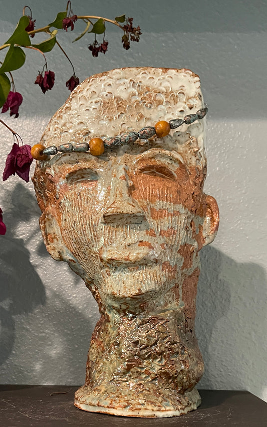 Textured Ancestry, 2024, ceramic and beads, 11 x 6 x 5 in. / 27.94 x 15.24 x 12.7 cm.
