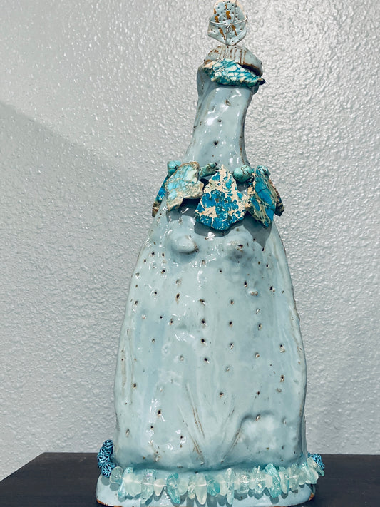 Bird Goddess Vessel, 2024, ceramic and beads, 12 x 8 x 3 in. / 30.48 x 20.32 x 7.62 cm.