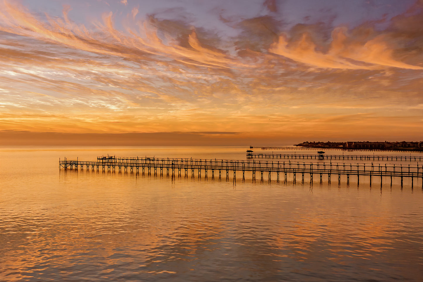 Piers and Reflections, 2024, archival print, 16 x 24 in. / 40.64 x 60.96 cm.
