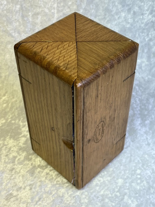 Across the Universe, 2023, wood, 6.5 x 3.25 x 3.25 in. / 16.51 x 8.255 x 8.255 cm.