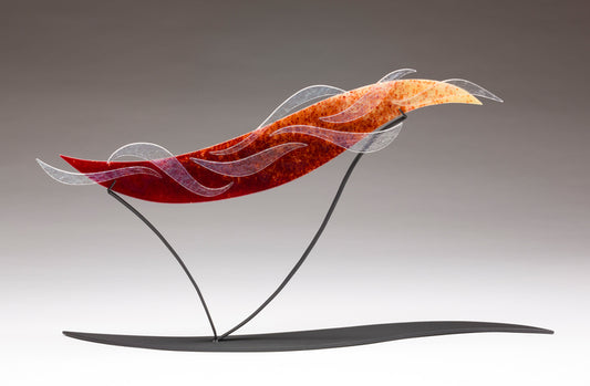 Chasing the Sunset, 2023, kiln-formed glass, 15 x 28 in. / 38.1 x 71.12 cm.