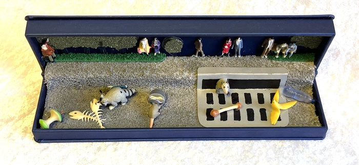 Cityscape, 2023, mixed media, 2.5 x 8.5 x 3.5 in. / 6.35 x 21.59 x 8.89 cm.