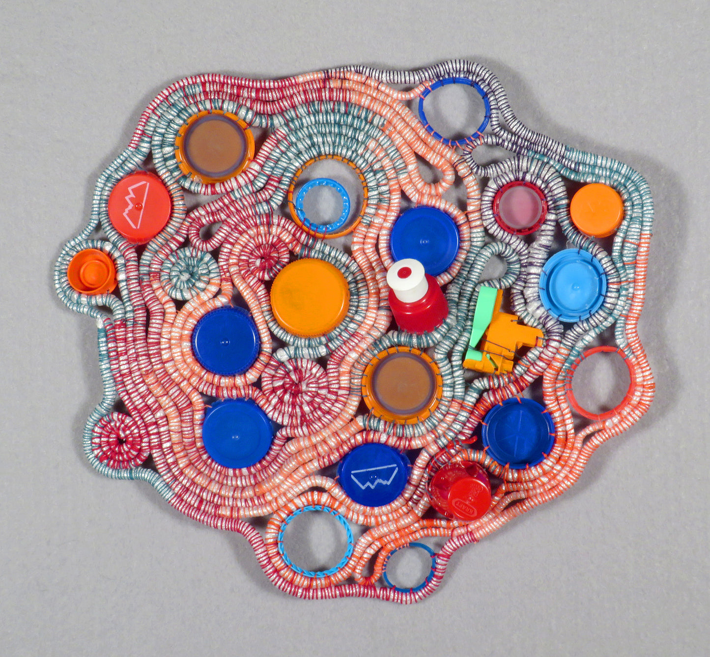 Compliments, 2023, coiled basketry, 13 x 14 x 2 in. / 33.02 x 35.56 x 5.08 cm.