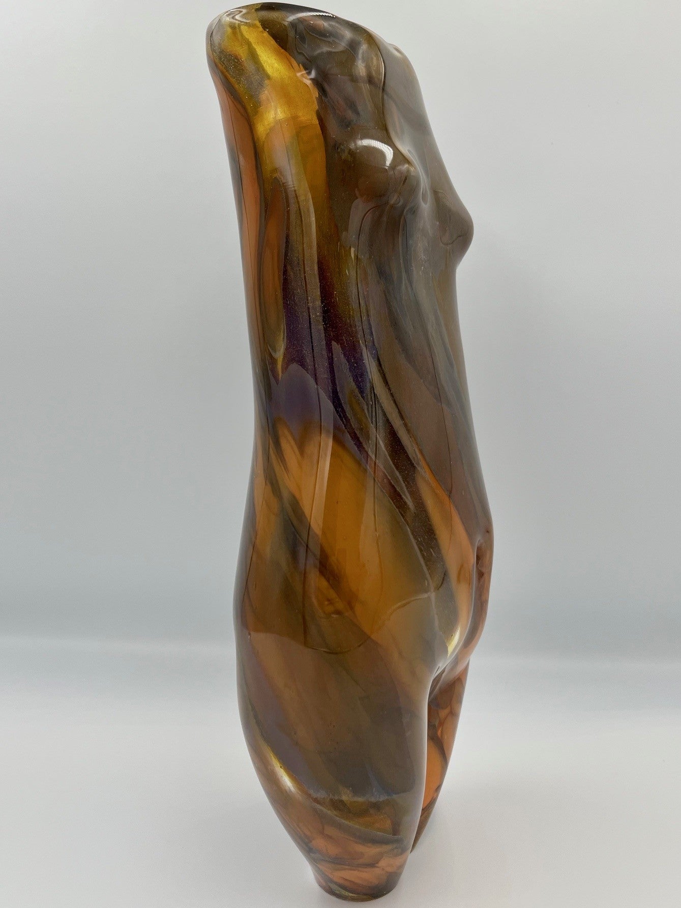 Figure from Fire, 2025, blown glass, 4 x 3 x 12 in. / 10.16 x 7.62 x 30.48 cm.