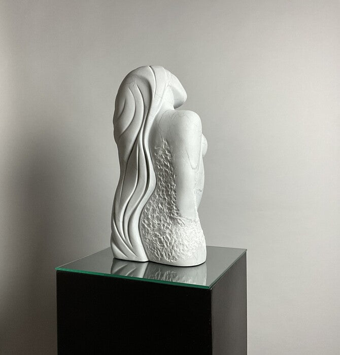 In The Flow, 2024, stone, 20 x 9 x 7 in. / 50.8 x 22.86 x 17.78 cm.