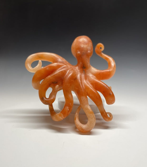 Luminosity, 2021, orange alabaster, 11 x 12 x 9 in. / 27.94 x 30.48 x 22.86 cm.