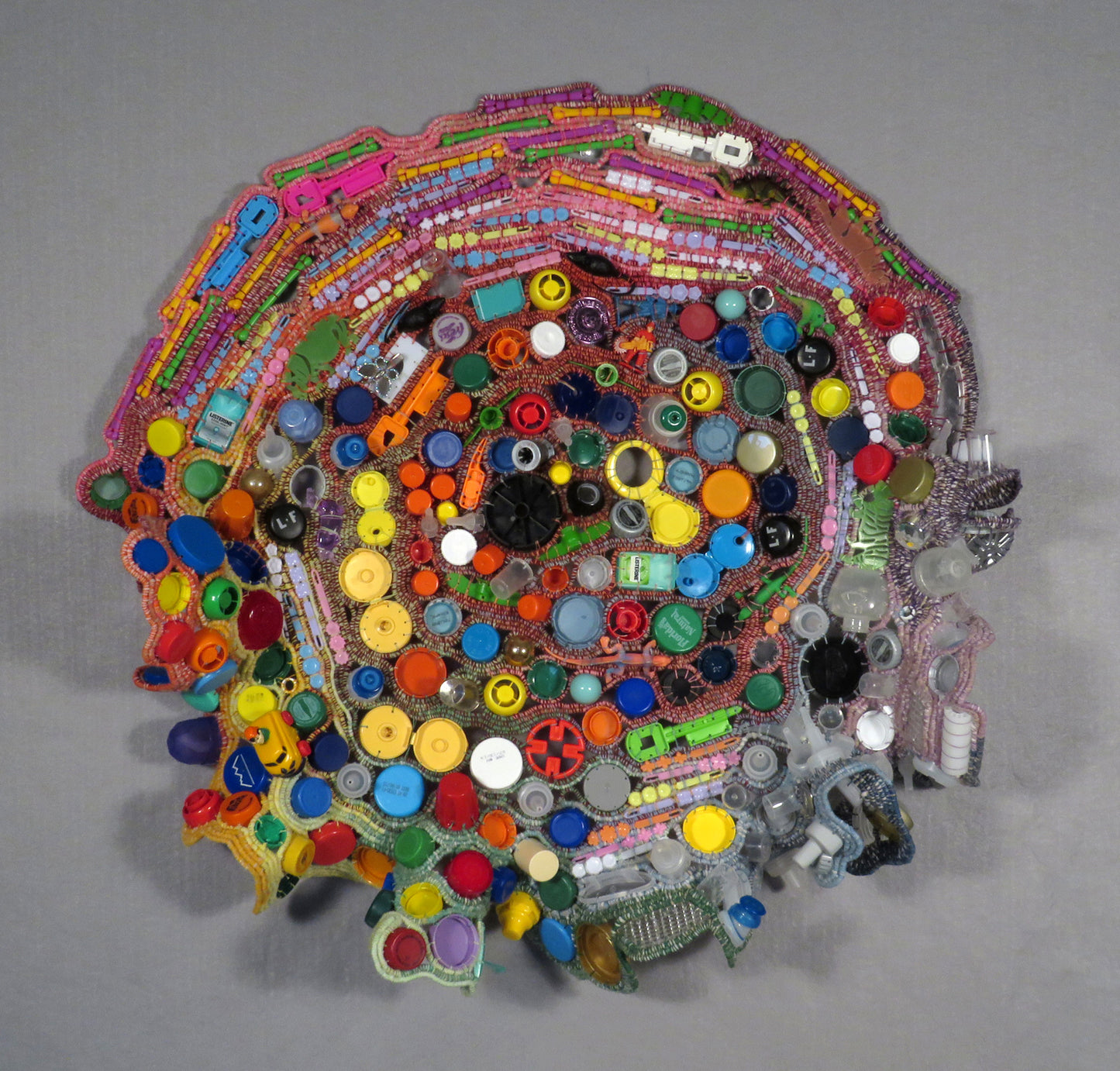 Plastic on the Beaches (Gyre No. 2), 2024, coiled basketry, 28 x 28 x 5 in. / 71.12 x 71.12 x 12.7 cm.