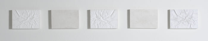 Wrinkle/Reverse, 2016, cast plaster, 9 x 70 in. / 22.86 x 177.8 cm.