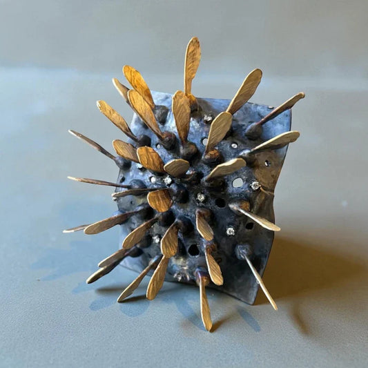 Seeds at The Edge of Flight, Soojin Jeong, 2025, mixed media, 4 x 3.5 x 2 in. / 10.16 x 8.89 x 5.08 cm.