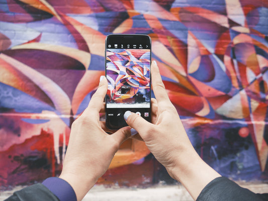 taking photos of public mural for art instagram