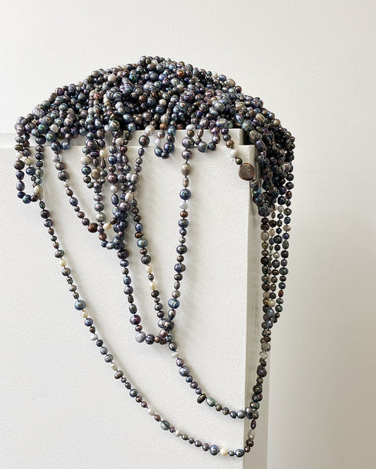 You Can’t Be Sure, In Fact, When It’s Really Over, 2017, freshwater pearls, silk, 4 x 8 x 7 in. / 10.16 x 20.32 x 17.78 cm.