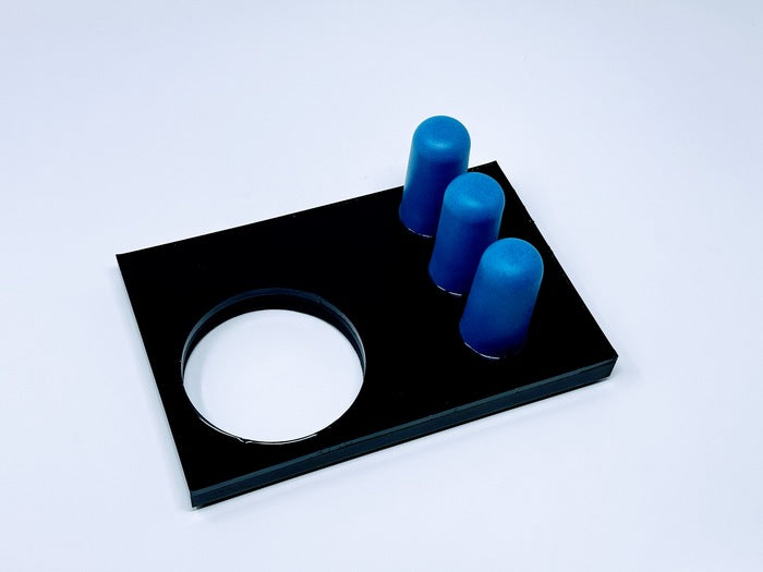 3 Knobs and a Hole, 2024, aqua-resin, 4 x 9 x 6 in. / 10.16 x 22.86 x 15.24 cm.