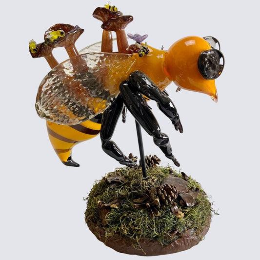 Metarhizium, 2023, hot-sculpted glass, preserved moss, found plant life, 16 x 14 x 11 in. / 40.64 x 35.56 x 27.94 cm.