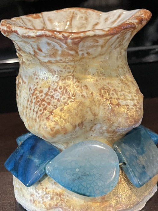 Golden Goddess, 2023, mixed media, 8 x 4 x 6 in. / 20.32 x 10.16 x 15.24 cm.