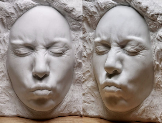 Awkward Kiss, 2023, marble, 16 x 16 x 6 in. / 40.64 x 40.64 x 15.24 cm.