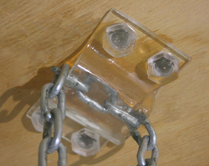 The Weight, 2024, mixed media, 82 x 16 x 16 in. / 208.28 x 40.64 x 40.64 cm.