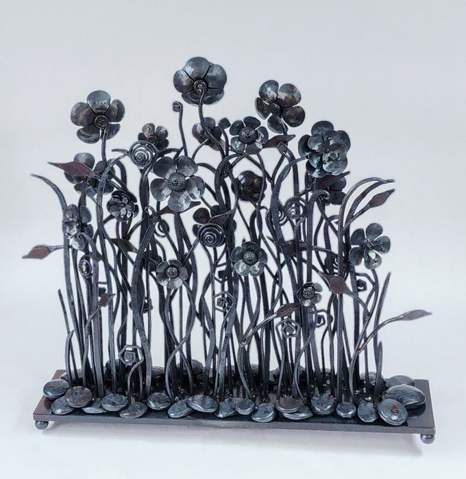Solus Planum, 2024, forged metal, 26 x 30 in. / 66.04 x 76.2 cm.