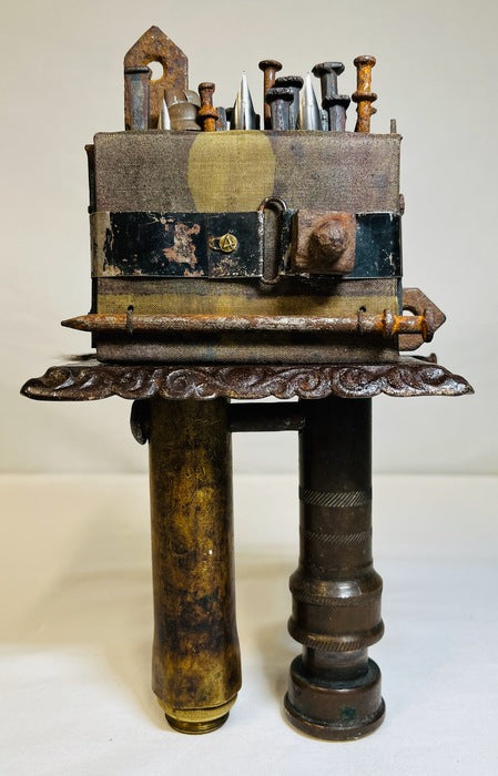 When Thought is Hammered In, 2025, mixed media, 8 x 4.7 x 3 in. / 20.32 x 11.93 x 7.62 cm.