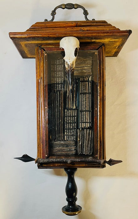 The Collector's Reliquary, 2025, mixed media, 17 x 9 x 5 in. / 43.18 x 22.86 x 12.7 cm.