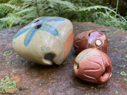 Bells: Entangled Particle Wave Functions, 2025, wood fired ceramic, 2.5 x 3 x 3 in. / 6.35 x 7.62 x 7.62 cm.