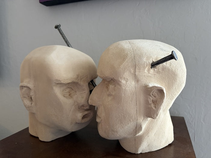 Can't Get Away, 2025, wood and steel, 8 x 13 x 6 in. / 20.32 x 33.02 x 15.24 cm.