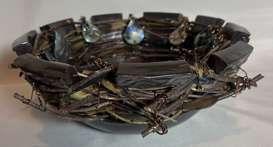 Nest, 2025, mixed media, 4 x 9.5 x 9.5 in. / 10.16 x 24.13 x 24.13 cm.
