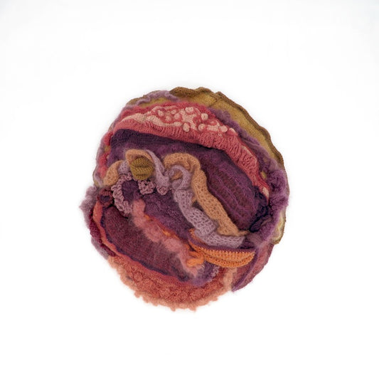 Forest Sunset, 2025, crochet, 17 x 16 x 5 in. / 43.18 x 40.64 x 12.7 cm.