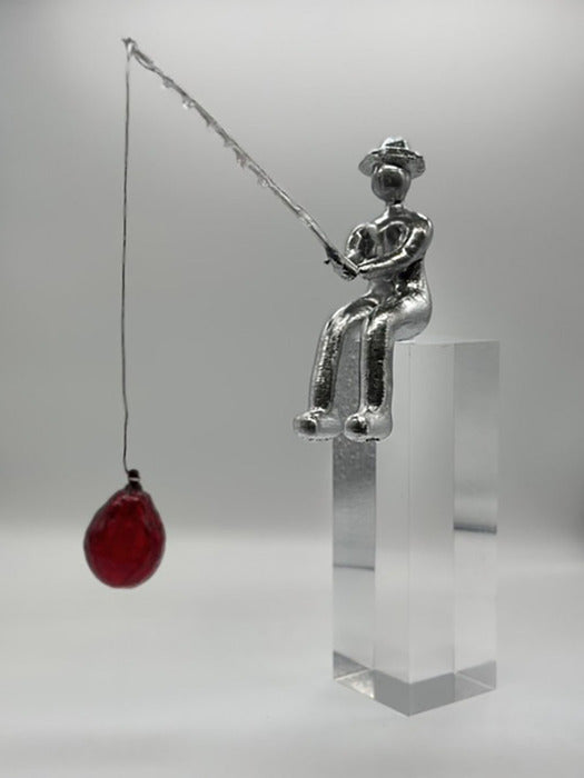 Unexpected, 2025, mixed media, 6 x 2 x 7.5 in. / 15.24 x 5.08 x 19.05 cm.