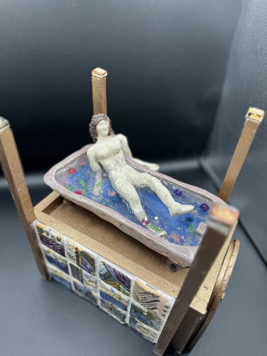 Lady Exiting the Bath, 2025, ceramics, 12 x 12 x 10 in. / 30.48 x 30.48 x 25.4 cm.