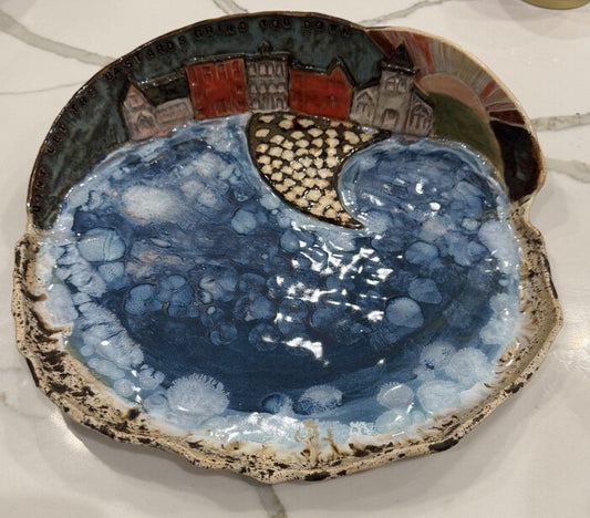 Don't Let the Bastards Grind You Down, 2025, ceramics, 7 x 17 x 6 in. / 17.78 x 43.18 x 15.24 cm.