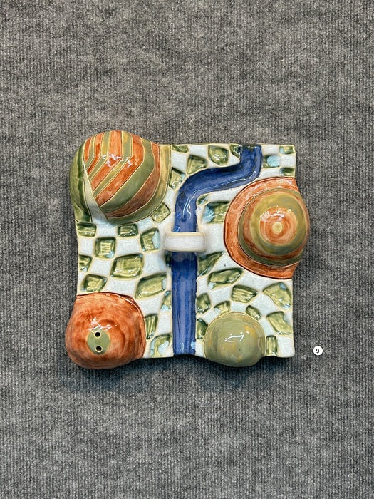 Bridge to the Portal of a Sleepy Dream, Interrupted, 2025, clay relief, 10 x 10 x 2 in. / 25.4 x 25.4 x 5.08 cm.