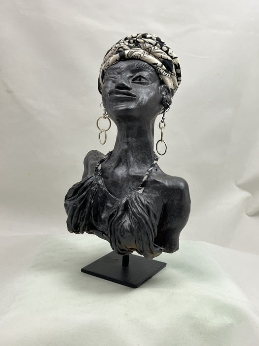 Wink, 2026, sculpture, 4 x 3 x 3 in. / 10.16 x 7.62 x 7.62 cm.