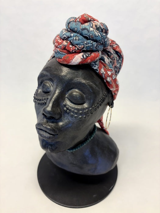 Beautification, 2025, stoneware, 8 x 6 x 8 in. / 20.32 x 15.24 x 20.32 cm.
