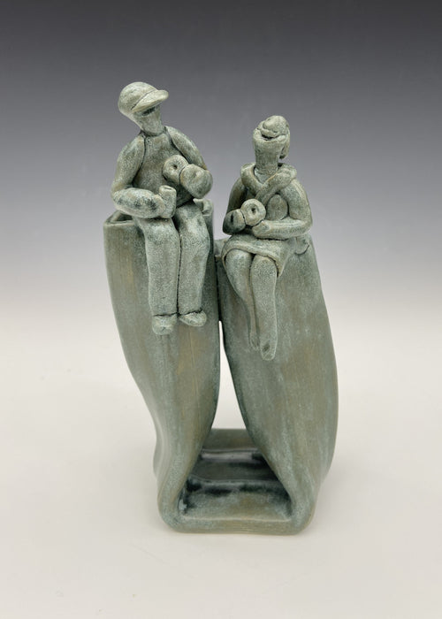 Bagels, 2025, glazed stoneware, 6.5 x 4 x 2.5 in. / 16.51 x 10.16 x 6.35 cm.